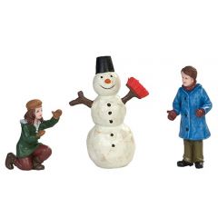 Dickensville Kinderen maken sneeuwpop